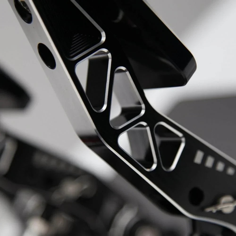 Simagic P2000 3-pedal set mounted on aluminium sim racing rig frame